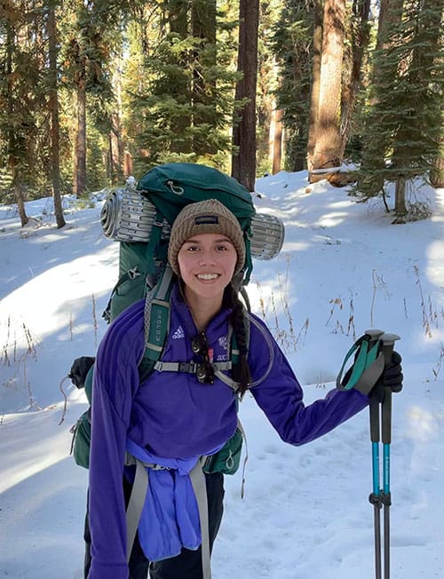 Samantha Sullivan hiking in snow