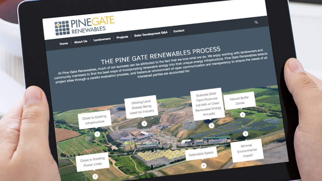 A tablet showing Pine Gate Renewables website